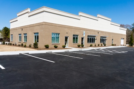 Parking lot washing for businesses how to remove oil stains and gum without damaging concrete